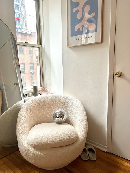 Home decor, swivel chair, disco ball, Sherpa chair, accent chair, apartment decor, decor for home, new apartment, apartment furniture, nyc apartment 

#LTKhome #LTKFind #LTKsalealert