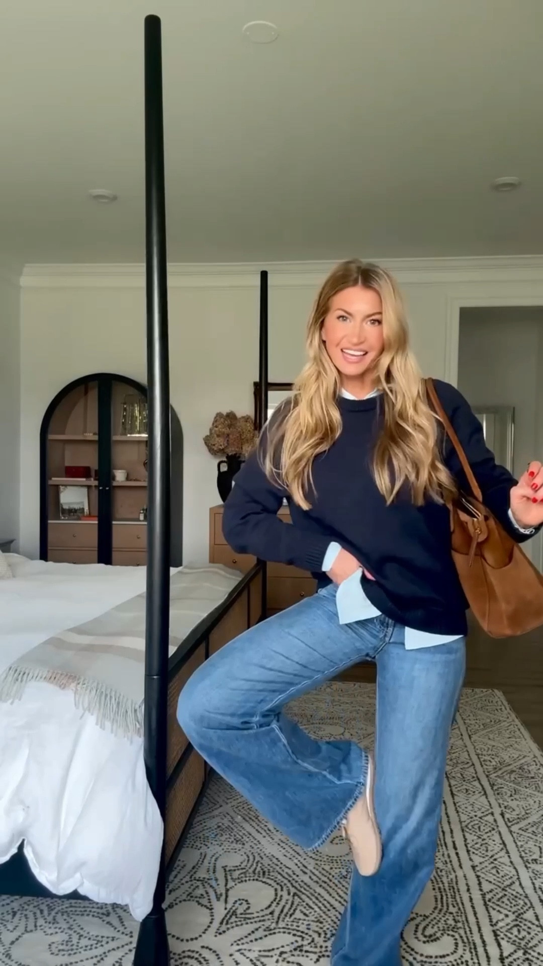 Casual mom outfit for going to the kids school. 
Light blue button up: runs oversized, wearing a small
Navy cotton heritage sweater : ON SALE! 60% off! it’s a men’s, so it runs large, wearing a medium, currently on sale!
High rise mid rinse flare jeans: OM MAJOR SALE - $200 off! TTS, wearing a 25
Nude leather sneakers: run TTS
#LTKStyleTip 

#LTKdayinmylife #LTKmomlife #LTKootd