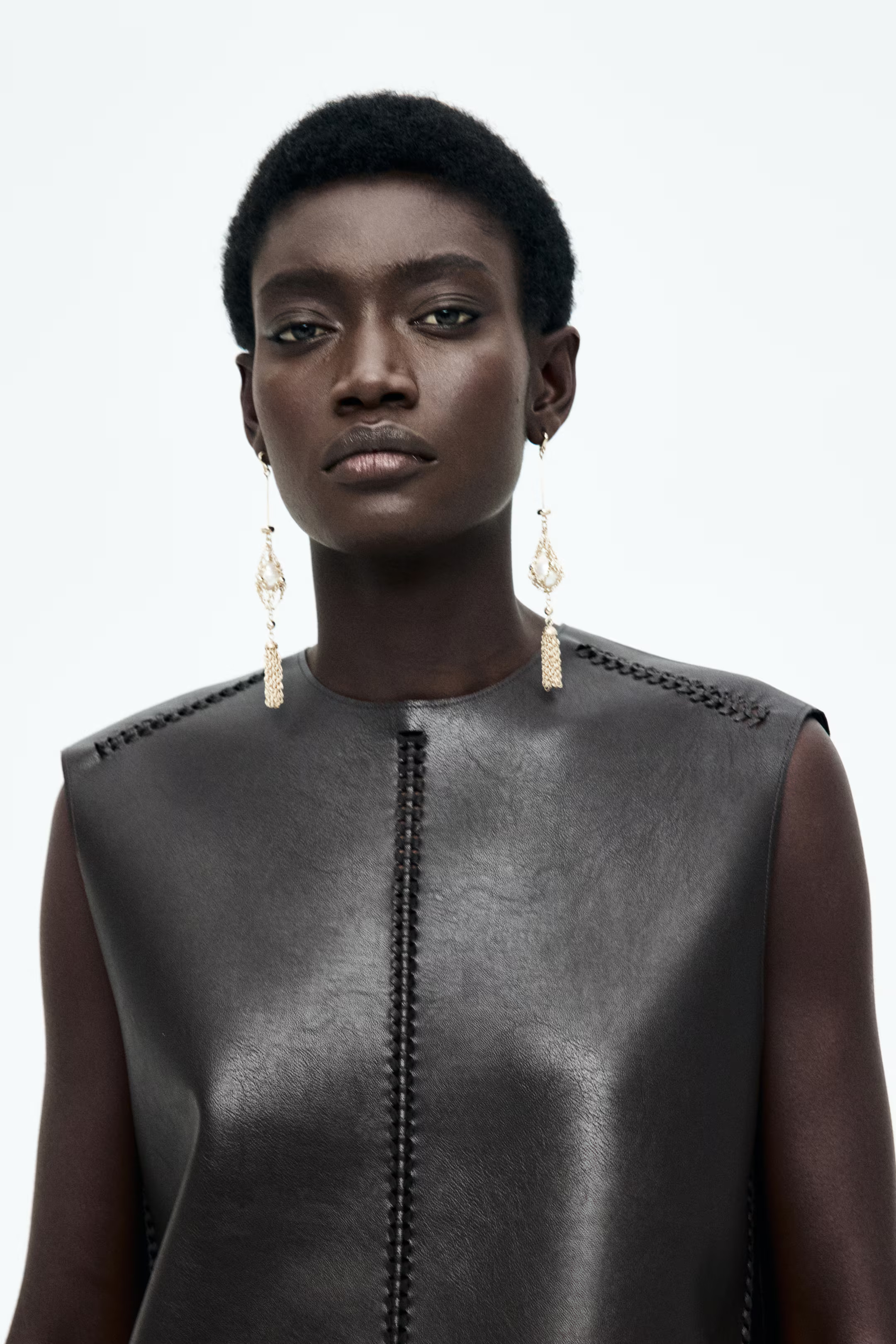 Gecoate jurk met gevlochten detail | H&M (DE, AT, CH, NL, FI)