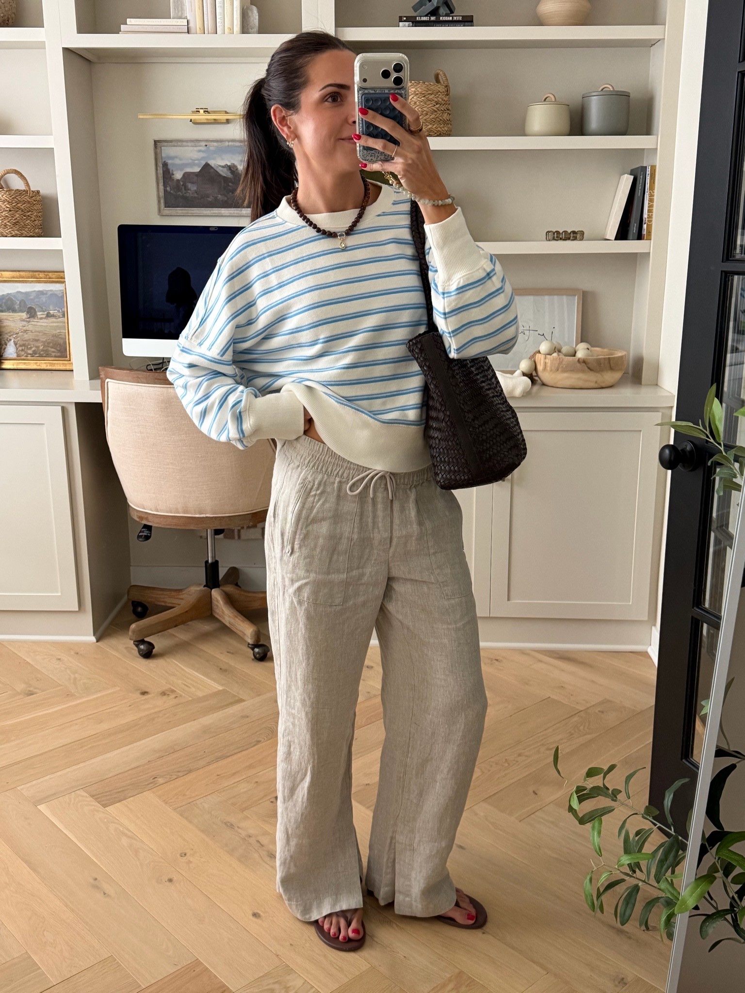 OOTD for a chilly AM baseball game ⚾️ 
Sweatshirt is 70% off and linen pants are 40% off!!
True size S in sweatshirt
Sized down 1 in pants (XS) regular length (5’7”)
Flip flops: size up for half sizes

#LTKmomlife #LTKSaleAlert #LTKootd
