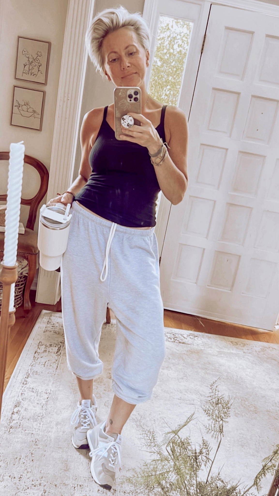 Headed out the door in the most comfy Saturday fit 🤎

#saturday #saturdayvibes #comfy #cozy #sweats #tank #stanley #target #AE 

#LTKsalealert #LTKstyletip