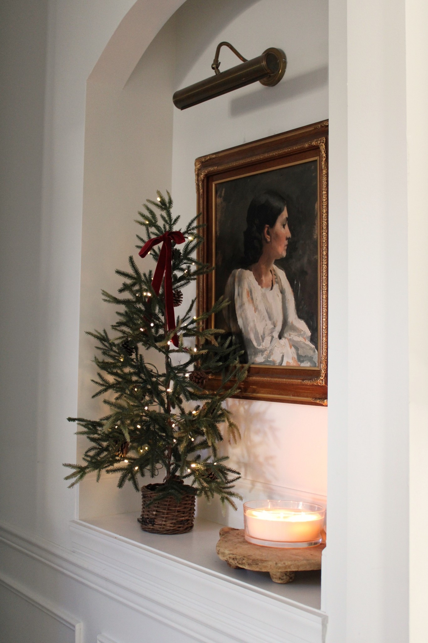 Small holiday corner, simple Christmas styling, simple Christmas ideas, vintage style portrait art, picture light 

#LTKFindsUnder100 #LTKHome #LTKStyleTip