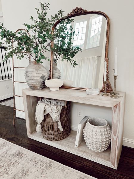 neutral entryway details ✨

I originally had gotten this mirror months ago and on sale for my fireplace mantle but ran into issues with trying to hang it and my mantle doesn’t meet the requirements for leaning it so here we are 👀 annnnd I’m IN loveeee with it here!! Ahhh 😌 

anywho, there’s five Target finds in this spot:
+ basket: older one no longer sold but linked some similar options
+ scalloped marble tray: I’m obsessed with it and looks cute on a nightstand or for a bathroom too
+ candle holders: older set but they have a newer one in the same color tone
+ pedestal bowl: reminds me of a pottery barn one but for less
+ blanket: hearth and hand and used it in my guest bedroom too! Love the cute tassels on it!

everything here will be linked in my bio! What do you think of this setup?

#entryway #entry #foyer #table #entrywaydecor #neutraldecor #neutrals #organicmodern 

#LTKstyletip #LTKhome #LTKFind