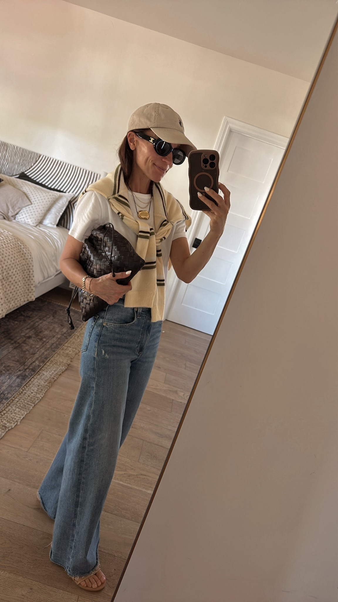 Today’s easy and repeatable outfit combo
Jeans + basic white tee + any striped sweater + cap + barely there sandals 

#LTKOver40 #LTKPetite