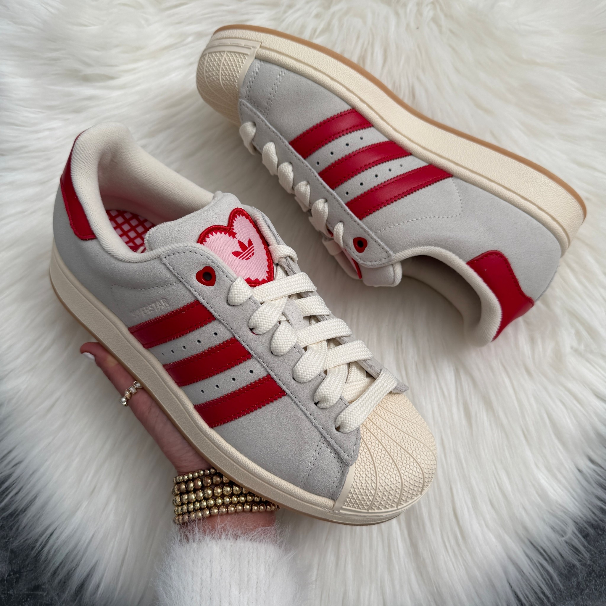 Woman’s Adidas Superstar II Sneaker. Runs true to size.