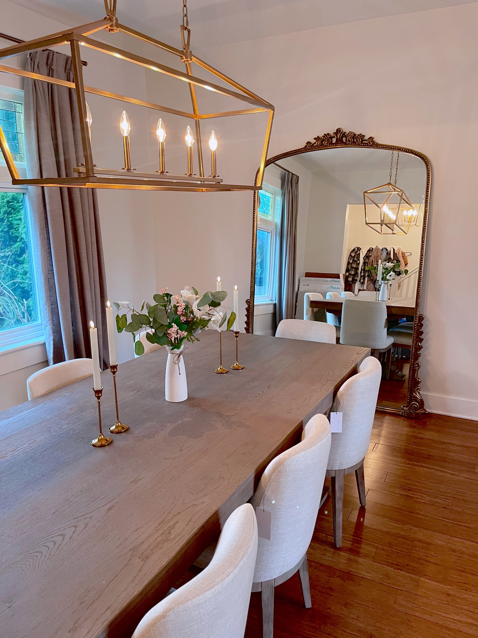 Dining room tablescape with amazon finds! 
.
.
.

modern farmhouse dining room - French inspired dining room - amazon home finds - amazon candles - dining room lighting - home decor Ideas - dining room inspo - home decor inspo - anthropologie mirror - gold chandelier 

#LTKstyletip #LTKhome