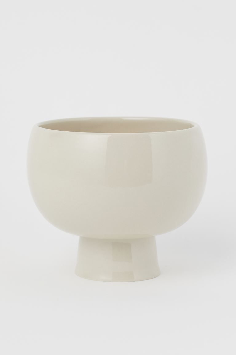 Footed plant pot in glazed ceramic. Diameter of base 3 1/2 in., diameter at widest point 7 1/2 in... | H&M (US + CA)