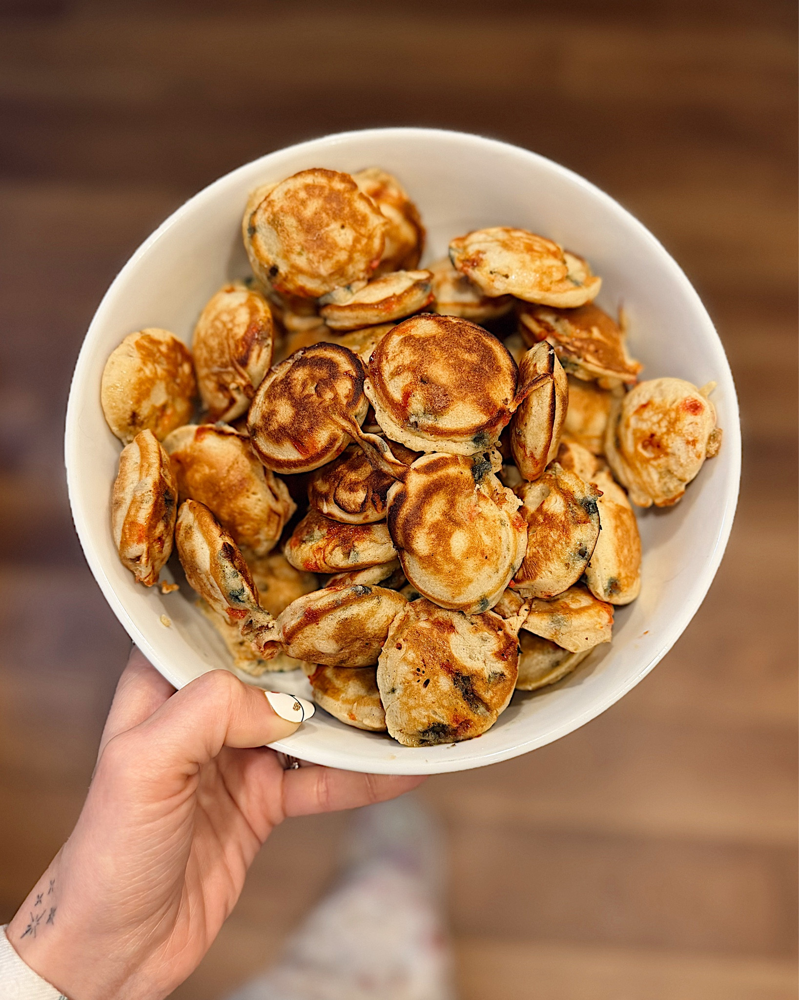 Hands down one of the best home purchases I’ve made this year! My girls plow through the mini pancakes from
Costco like it’s water, so I did some research into these Dutch mini pancake makers! I swapped out the tradition recipe for a sourdough version for added tummy benefits plus some artificial dye free sprinkles for a holiday spin!

#LTKfoodie #LTKHome #LTKFindsUnder50