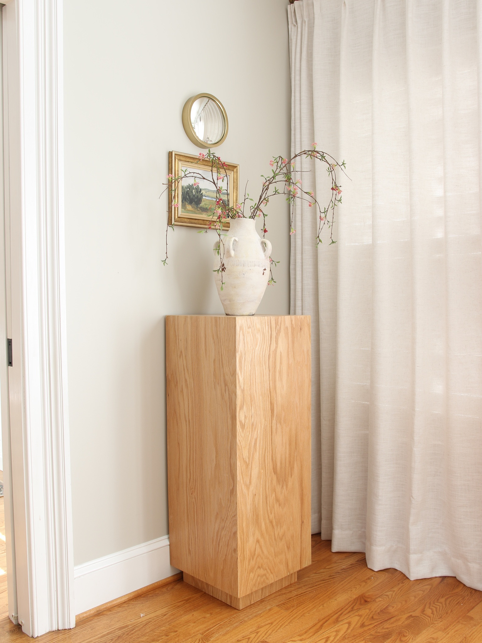 This may look like the McGee and Co plinth pedestal but I actually made it myself. It is topped with one of my favorite Pottery Barn Artisan vases 

#LTKFind #LTKhome #LTKstyletip