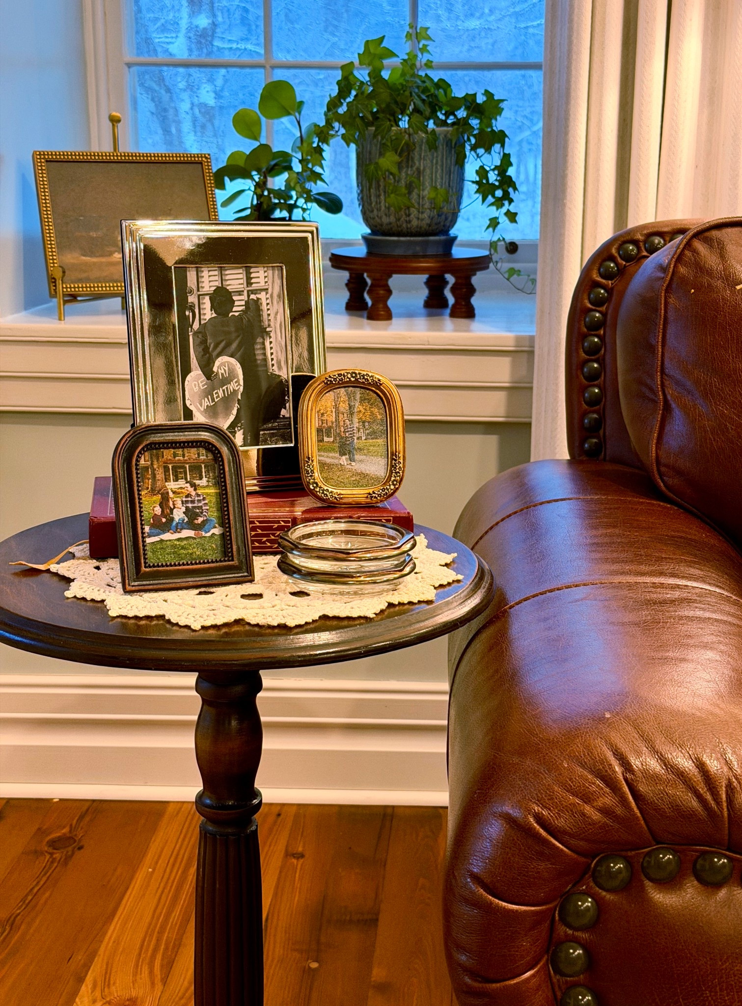 Adding collected frames to my small vintage end table. Adds some charm to the space. 

#LTKHome #LTKU