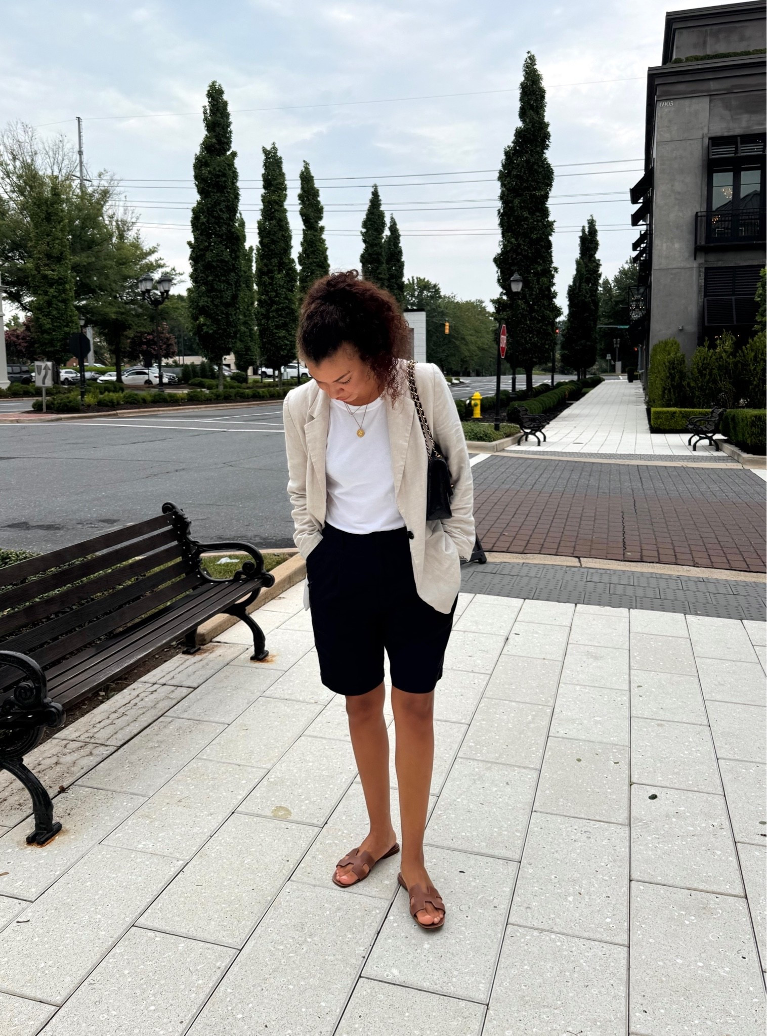 Casual chic summer outfit: linen blazer, tank top, long pleated shorts, leather sandals

#LTKootd
