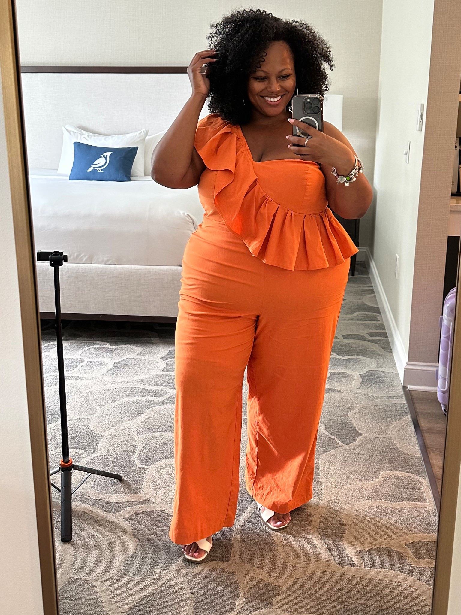This jumpsuit is so perfect and the orange color makes it a great transition piece for fall. 

#LTKMidsize #LTKWorkwear #LTKPlusSize