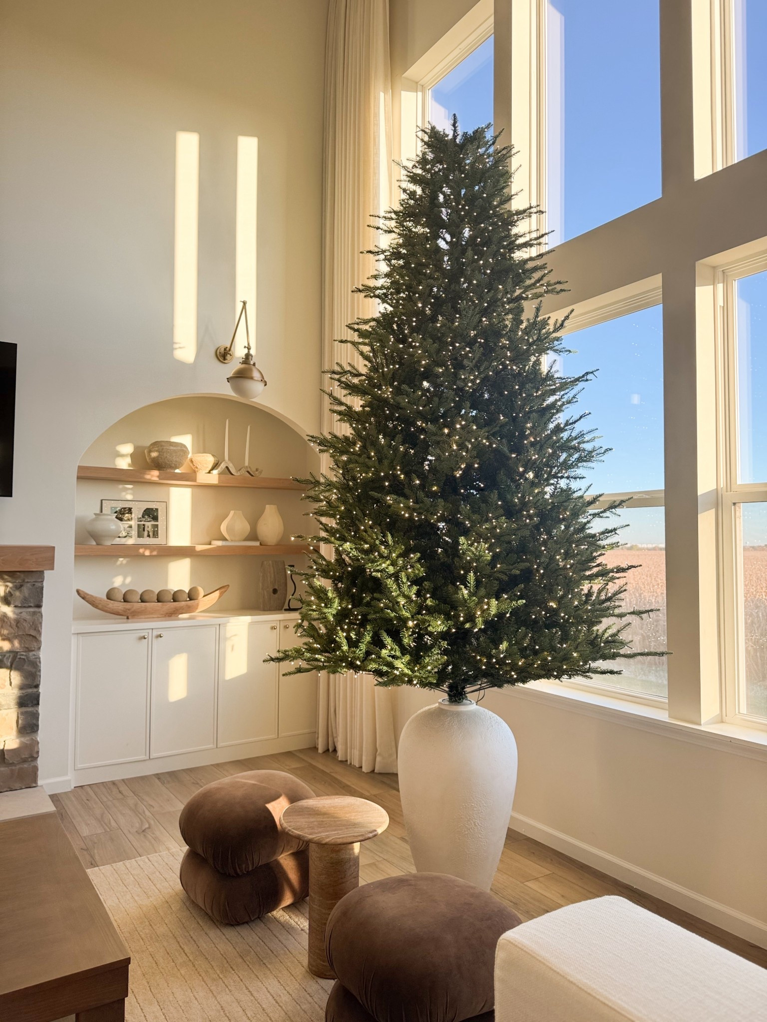 Got our 9ft Grand Duchess Balsam Fir up 🤎 styled it in a floor vase this year and I’m obsessed! It feels so full, timeless, and elevated ✨

Christmas Tree, Christmas holiday finds, holiday decor, Christmas ornaments, Christmas floor vase, Christmas basket 

#LTKHoliday #LTKOver40 #LTKSeasonal