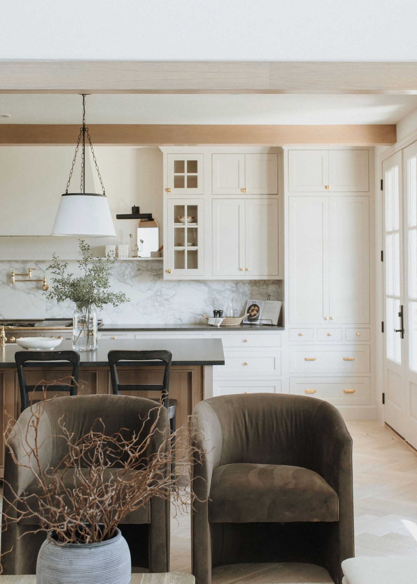 Wouldn’t it be cute if our kitchen counters and island always stayed clean and organized. 😅 If you’re looking for a luxe looking accent chair at an affordable price, this is one of our favorite options. The rich brown brings in a ton of warmth and the high backs provide tons of comfort. Husband approved! 

#LTKHome #LTKStyleTip #LTKSaleAlert