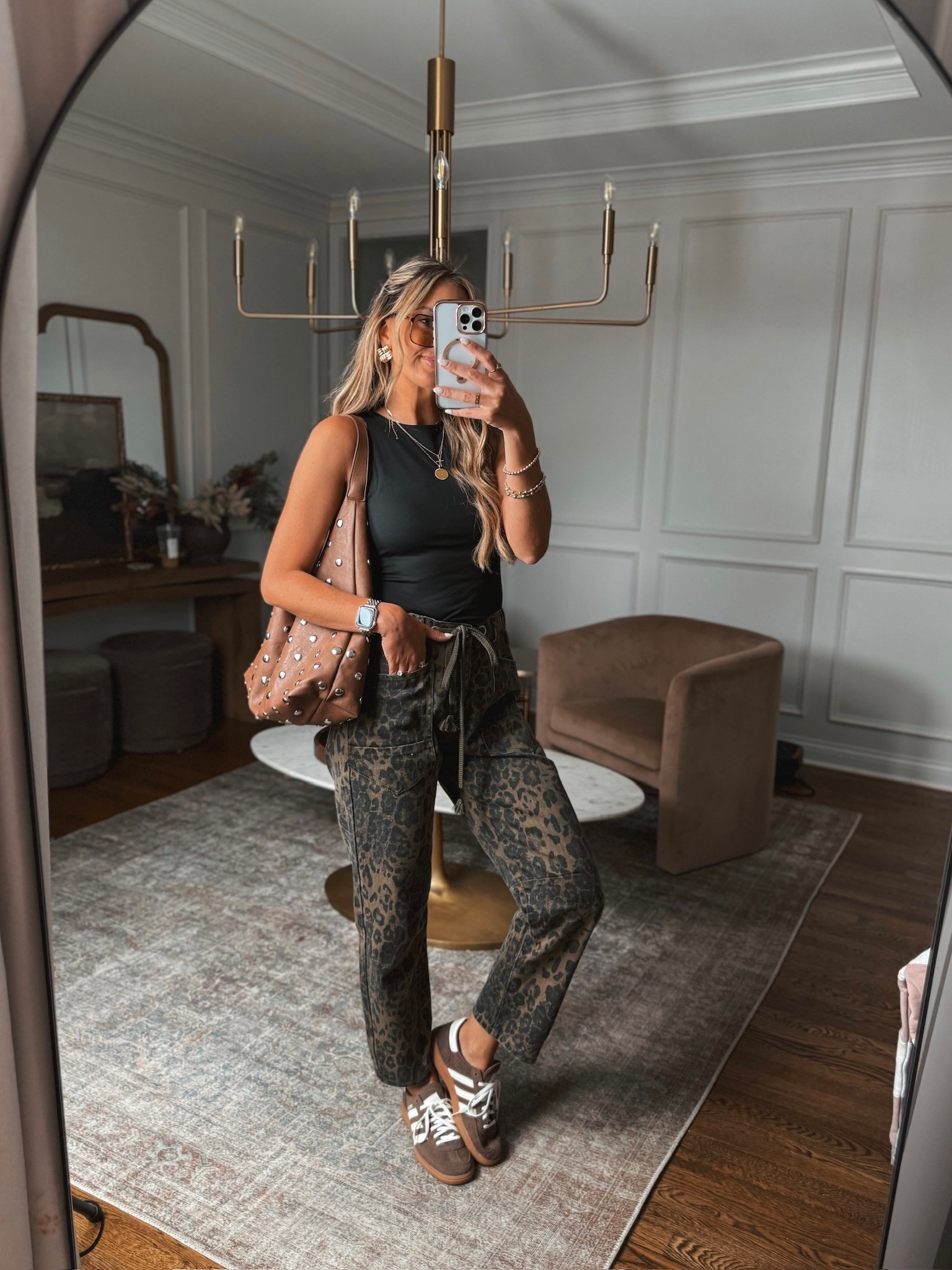 The cutest fall outfit! I love the drawstring waist detail on these leopard print barrel jeans. The low-rise fit is super flattering. It would be a great date night outfit!

#LTKTravel #LTKStyleTip #LTKFindsUnder50