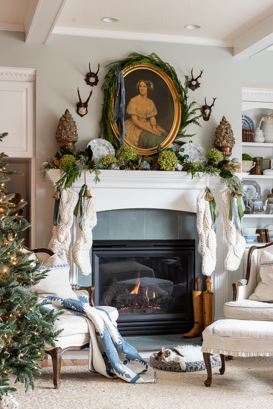 Our Christmas mantle in our Minnesota house a few years ago.  I love these chunky knit stockings, and they are still available.  (I also found a twin to my framed Jenny Lind print for under $200.) 

 #LTKGiftGuide #LTKSeasonal #LTKHome