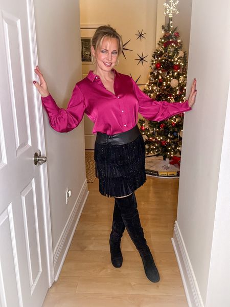 The fringe skirt from DKNY has been a fan favorite! The satin button-down from Nordstrom has been one of mine…so much so I bought it in multiple colors. Over the knee boots are trending. If you’re wanting a more low-key look, try a golden cami and over-sized blazer! 

#LTKHoliday #LTKparties #LTKover40