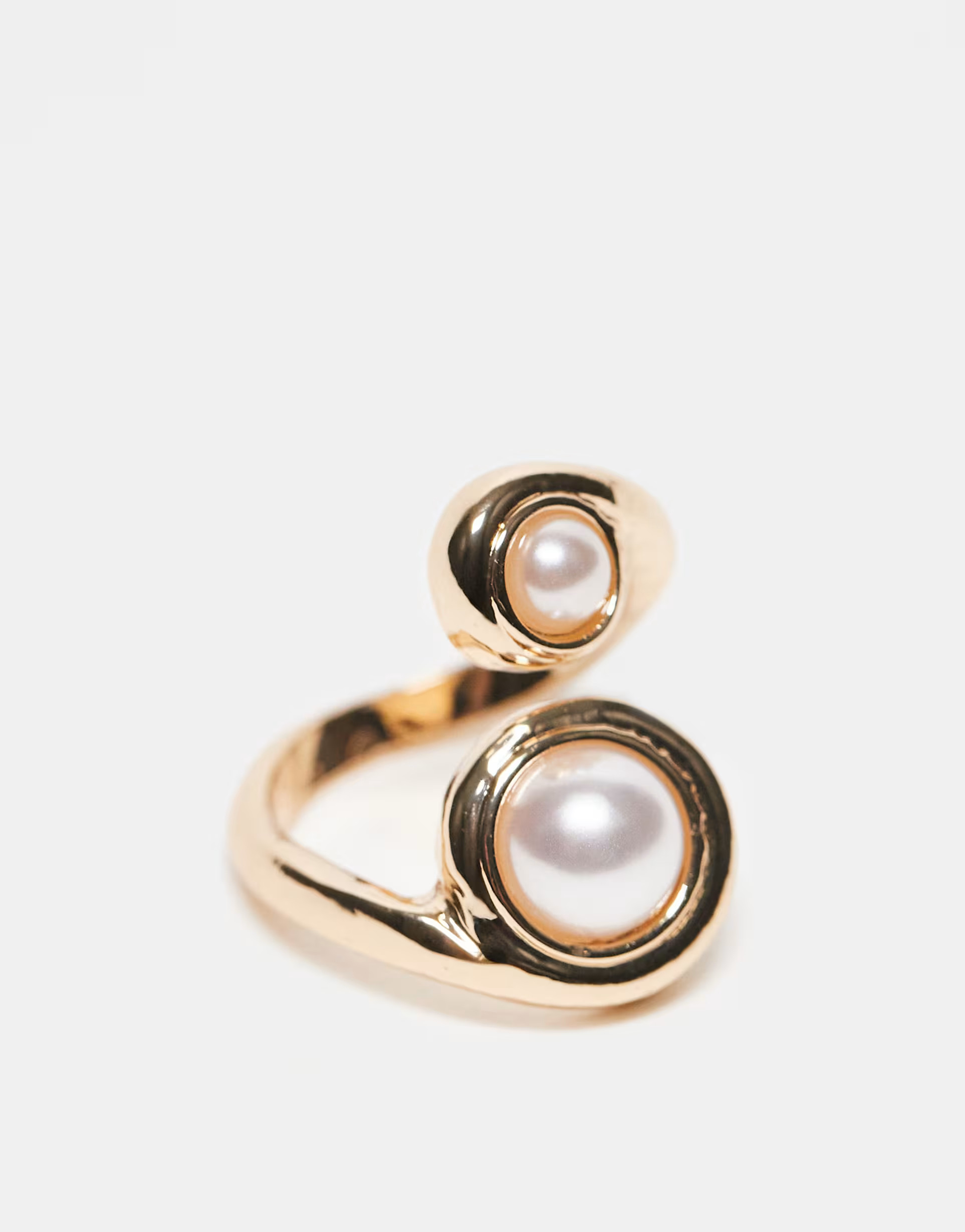 ASOS DESIGN wraparound ring with faux pearl detail in gold tone | ASOS (Global)