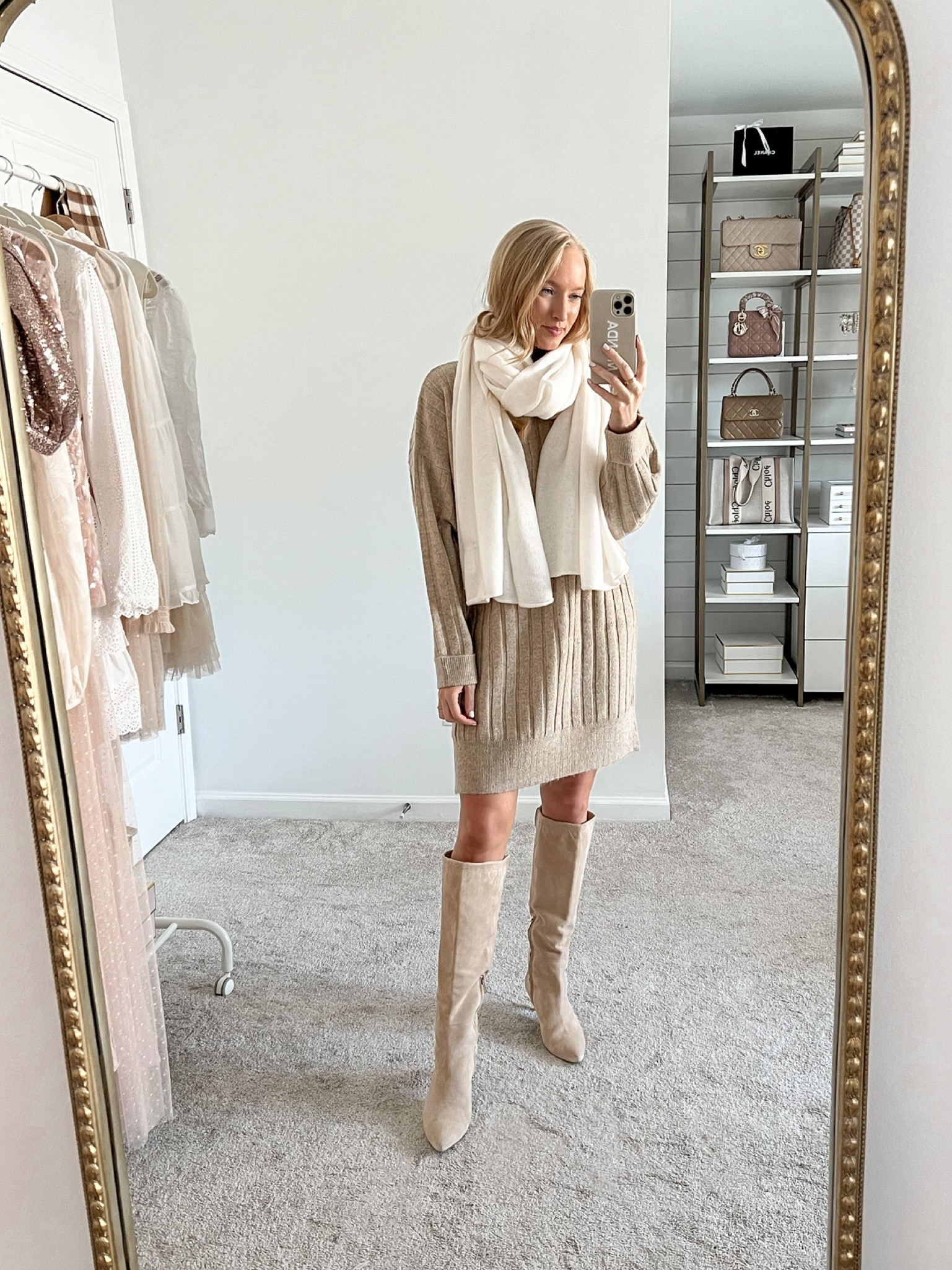 Sweater dress with a cashmere wrap scarf and knee high boots 

Sweater dress runs big and roomy! 