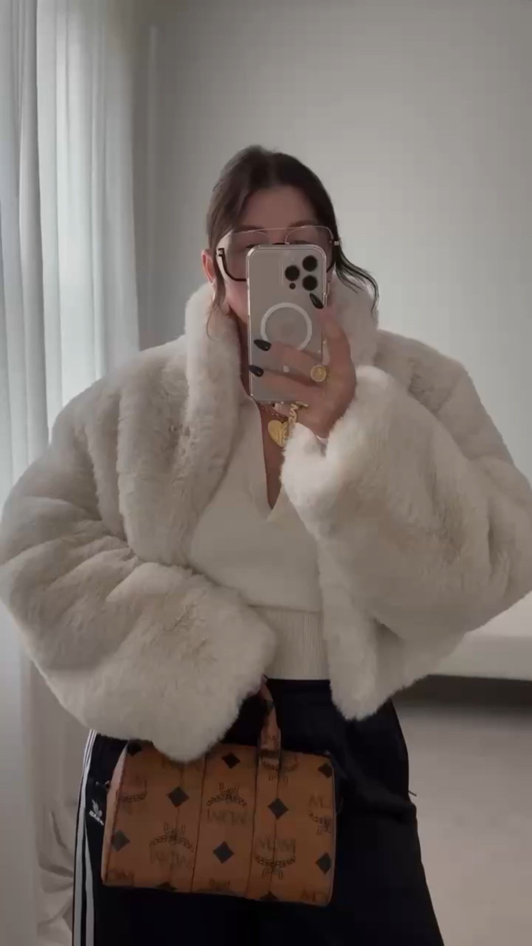 Winter outfit 
Faux fur jacket
Track pants 

#LTKActive #LTKSeasonal