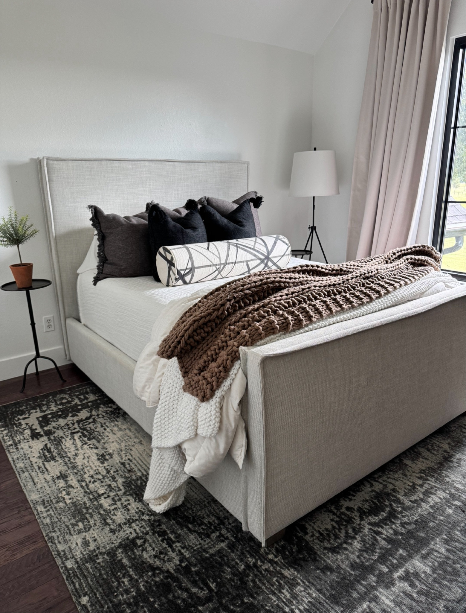 Guest room bed 
Distressed arabesque wool rug 
Bolster pillow no longer available 

#LTKStyleTip #LTKHome