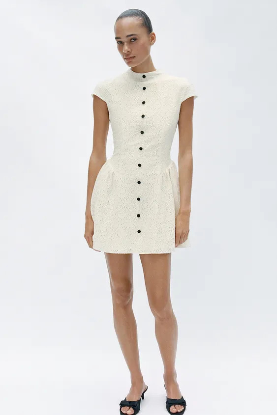 Round-neck, short-sleeve dress. A-line hem with side gathers and contrasting faux front buttons. ... | Zara US