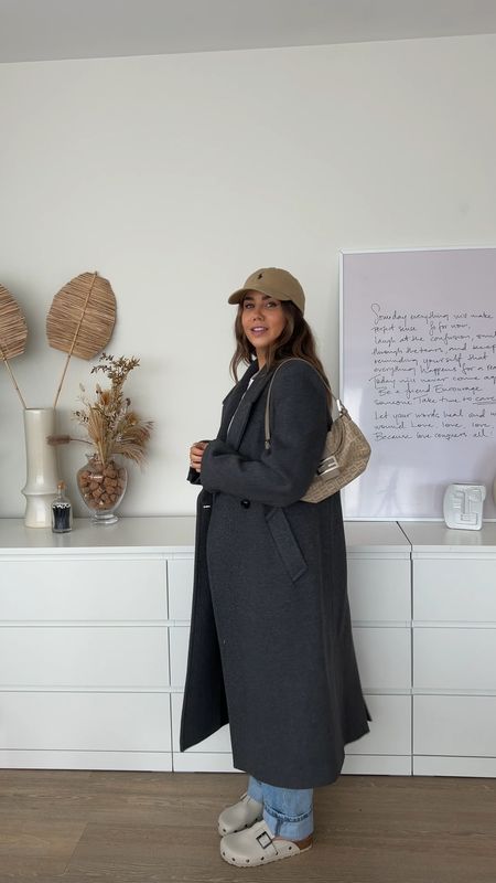 Mango longline grey tailored coat styled with Ralph Lauren beige cap, white baby tee and midrise jeans with birkenstock Boston clog dupes 

#LTKfindsunder100 #LTKstyletip