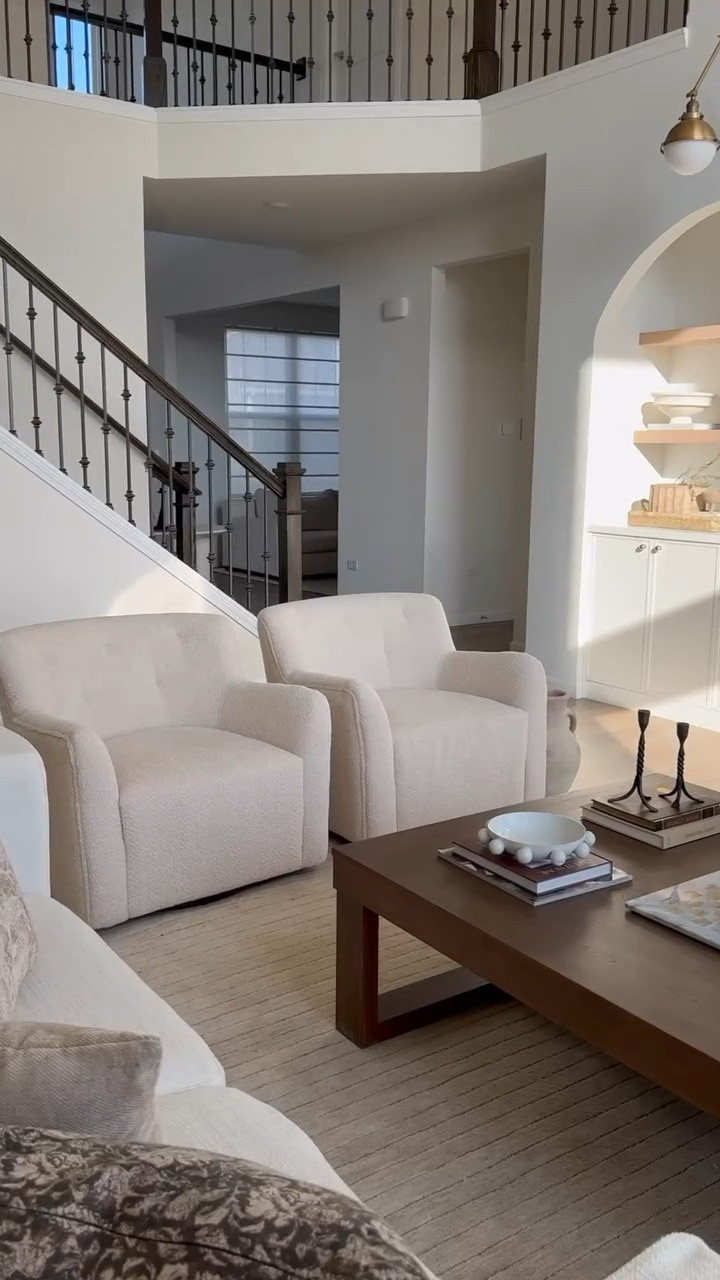 These neutral chairs bring that high-end look without the price. The shape, the fabric-everything about them just works, and they make the space feel so inviting🫶🏼

#LTKHome #LTKMostLoved #LTKSaleAlert