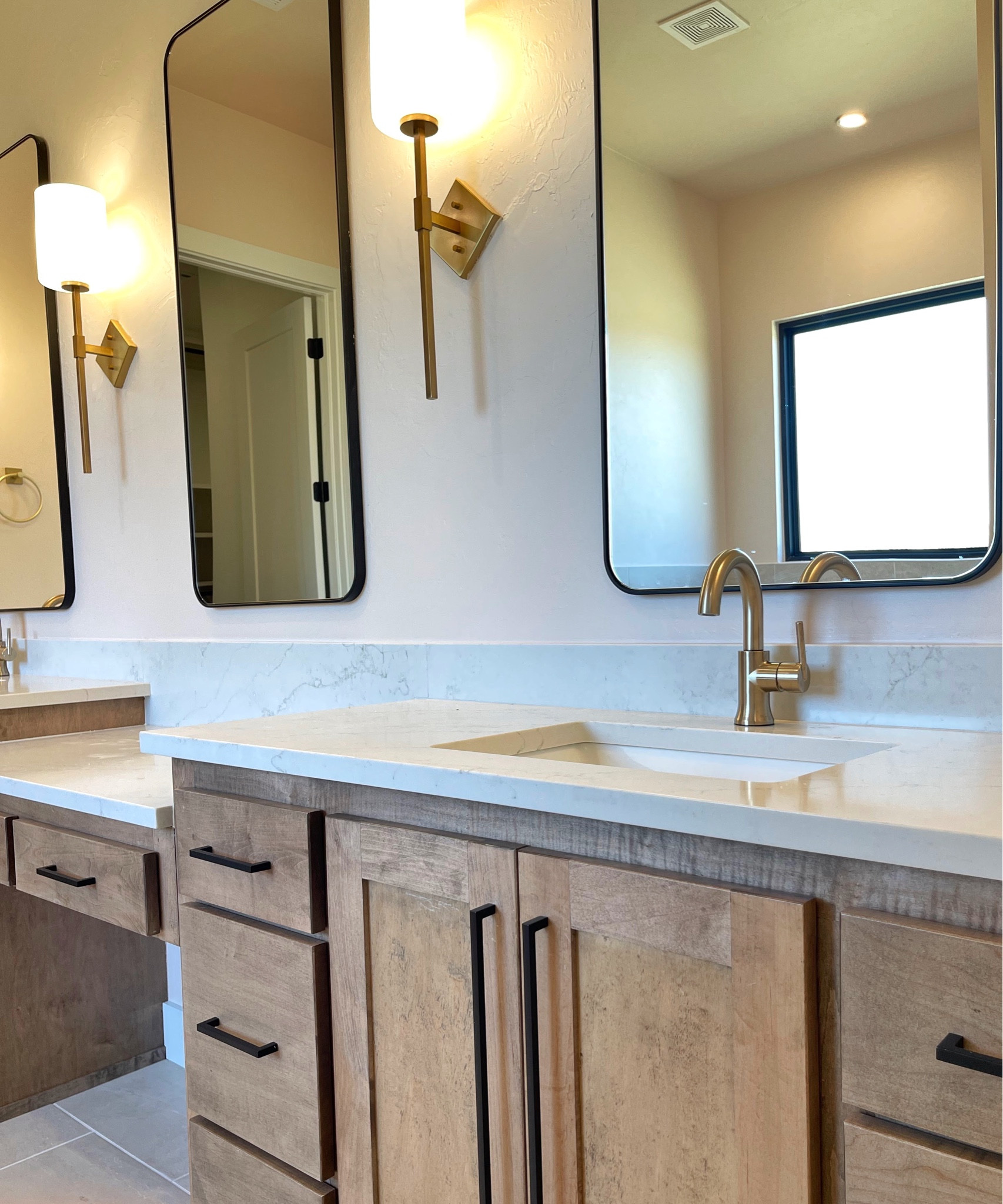Bathroom design with light wood stain and mixed metals.  Brass and black .

#LTKstyletip #LTKhome