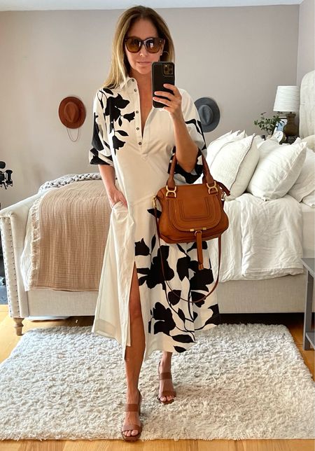 Spring will be here before we know it! 🌸 This asymmetrical black + white dress can go ANYWHERE. It has a slit in front and is loose, so I’m wearing an XS. It’s lined and has pockets. I love pairing black and whites with brown accessories.

#LTKitbag #LTKFind #LTKstyletip