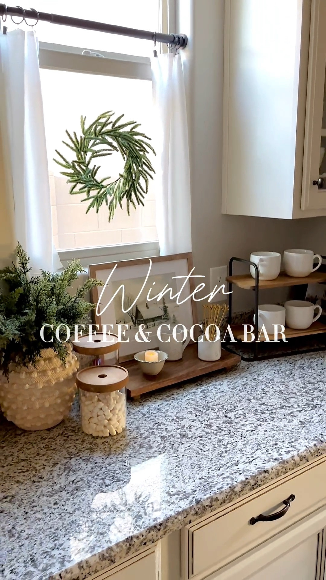 Winter coffee and cocoa bar 🌲

Follow @lifeinmyarizonahome on Instagram for more ideas and inspiration. 

I transitioned to a winter coffee and cocoa bar keeping some greenery out and adding in some winter artwork. This beautiful textured vase, white mugs, and a flameless candle to still keep things cozy, all help complete the look. 

#coffeebar #cocoabar #winterdecor #butlerspantry 

#LTKSeasonal #LTKFindsUnder50 #LTKHome