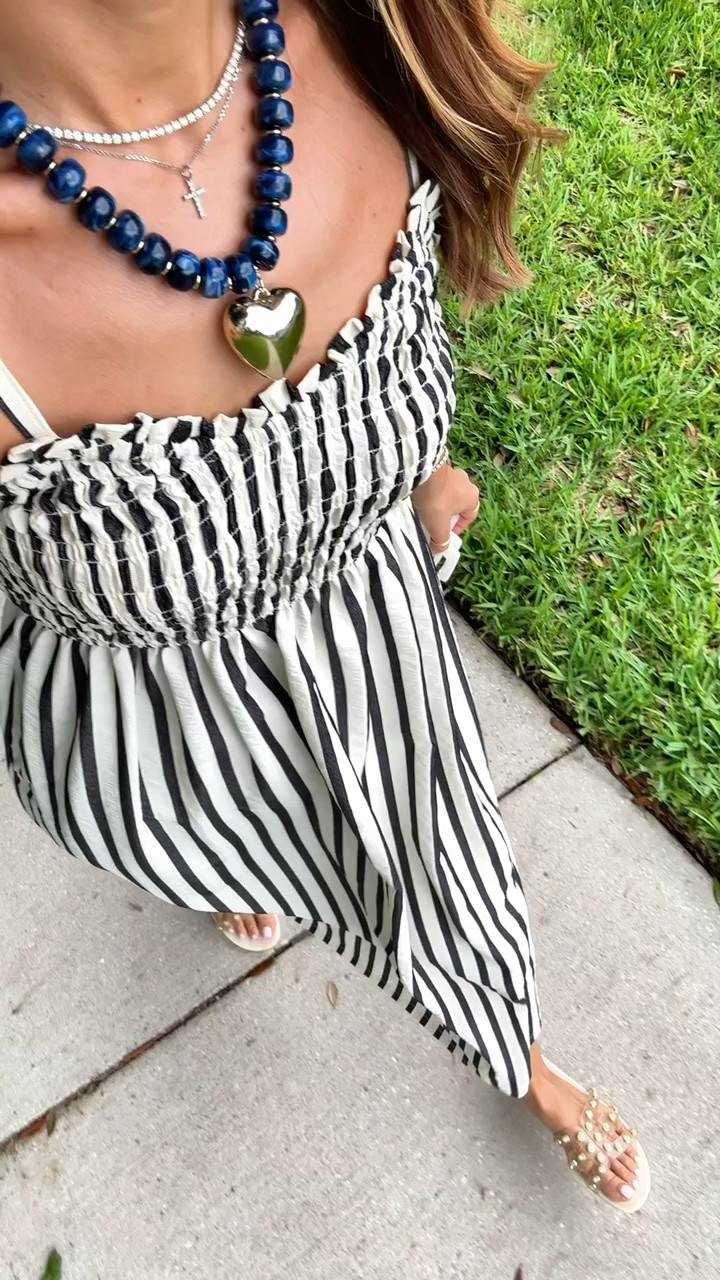 The prettiest Amazon striped dress for the 4th of July! Wearing XS. Memorial day weekend. Barbecue outfit. Summer outfit. Summer dress. Vacation dress. Vacation outfit. Swimsuit coverup. Amazon heart necklace. Pearl Kelly slides are whole sizes only - I’m a 6.5 and did a 7.

#LTKootd #LTKTravel #LTKSwim