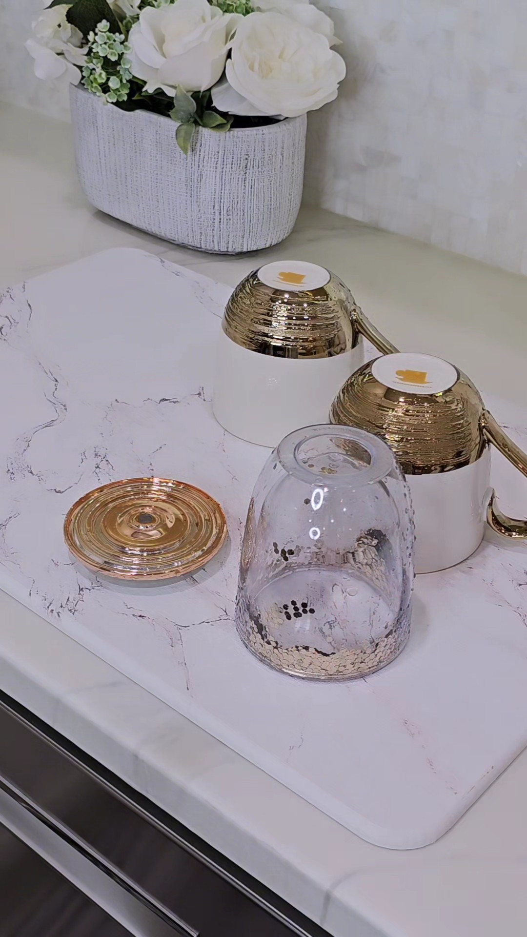 Say goodbye to your dish rags and welcome this elegant stone drying mat. Its marble design and sleek look let you keep it on your counter without any mess

#LTKhome #LTKVideo