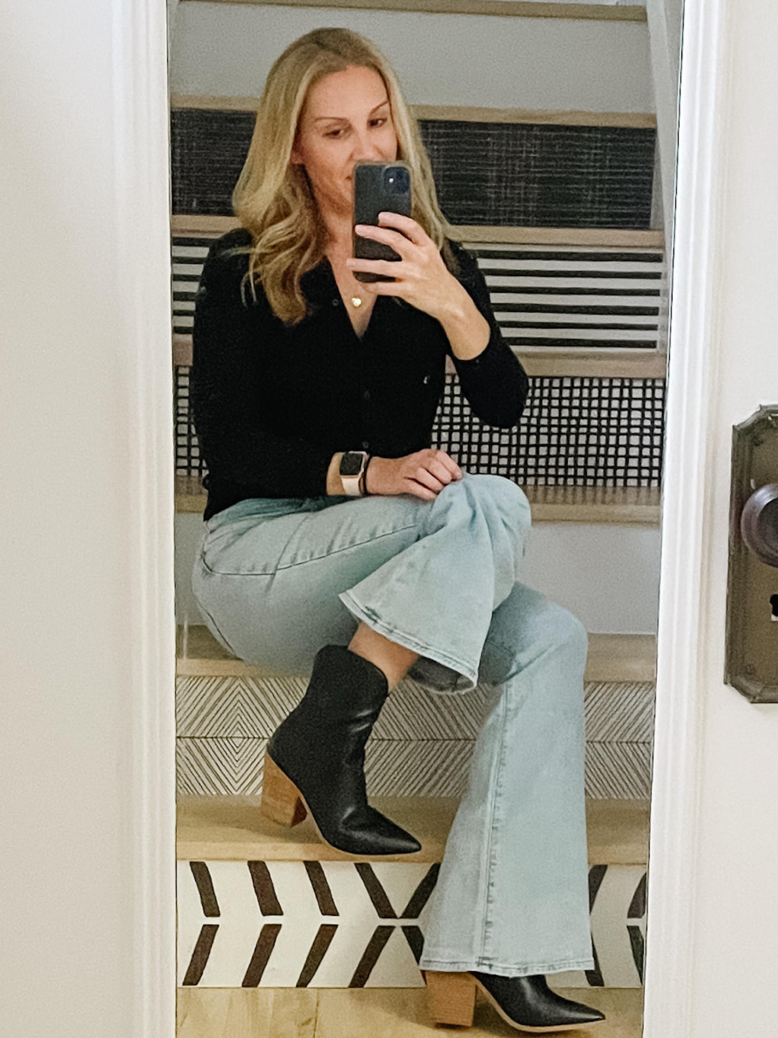 These high waisted flare jeans are my new obsession along with my short black cowboy boots. I added a simple buttoned up black cardigan to finish off my date night outfit 

#LTKSeasonal #LTKcurves #LTKworkwear