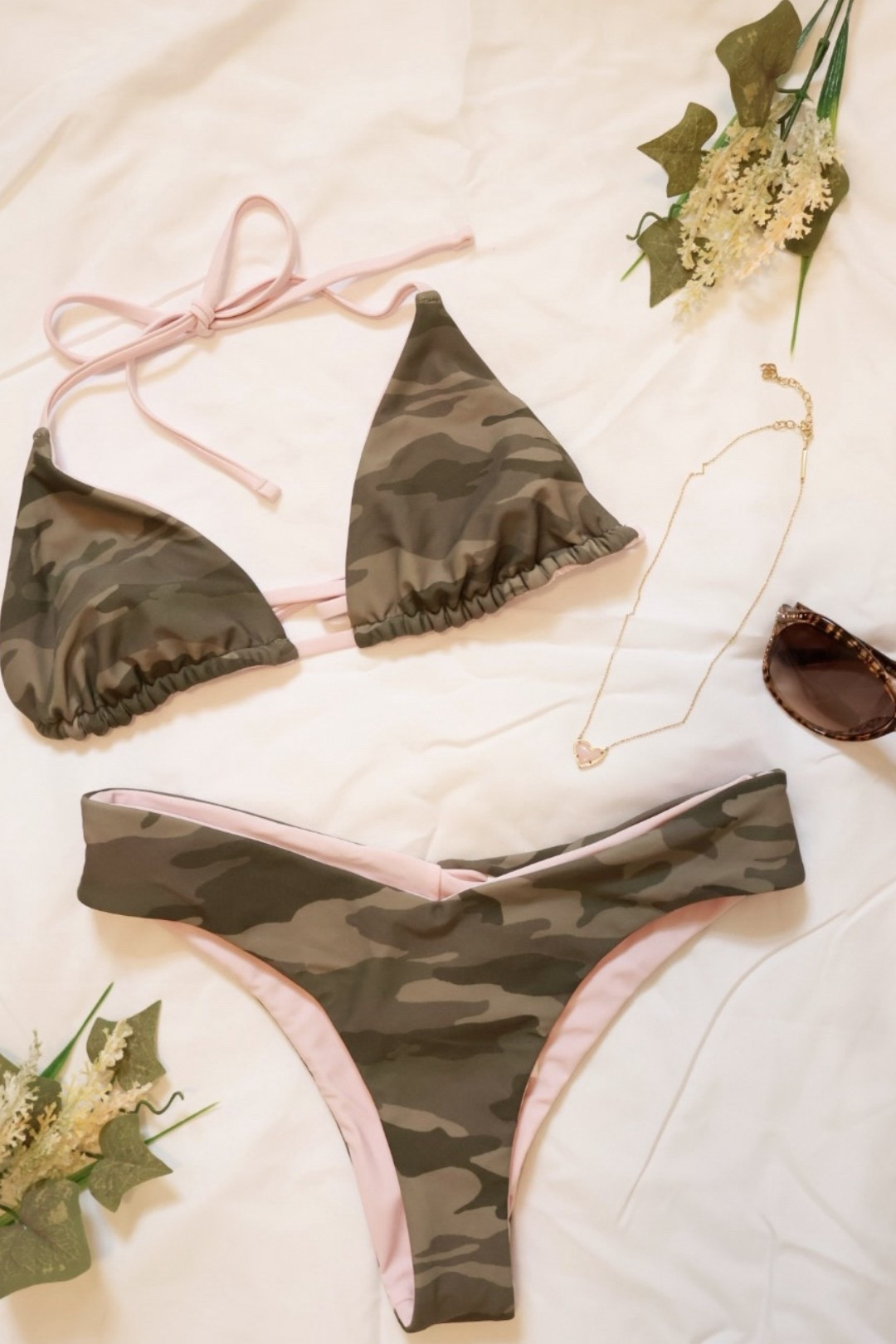 #hollister #flatlay #outfitinspo #bikiniseason #bikinihaul #swimhaul #pinkcamo #coastalcowgirl 

#LTKootd #LTKSeasonal #LTKSwim