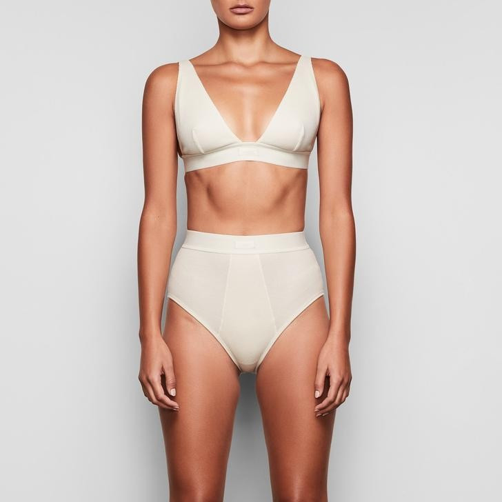 COTTON PLUNGE BRALETTE | BONE | SKIMS (US)