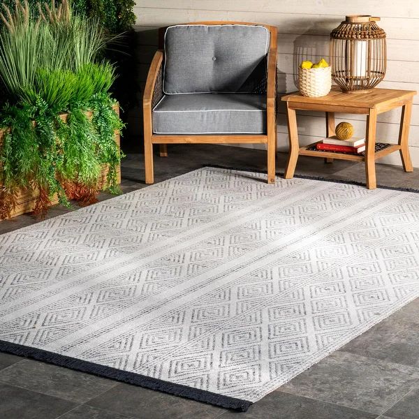 The Curated Nomad Frida Indoor/ Outdoor Geometric Striped Tassels Area Rug | Bed Bath & Beyond