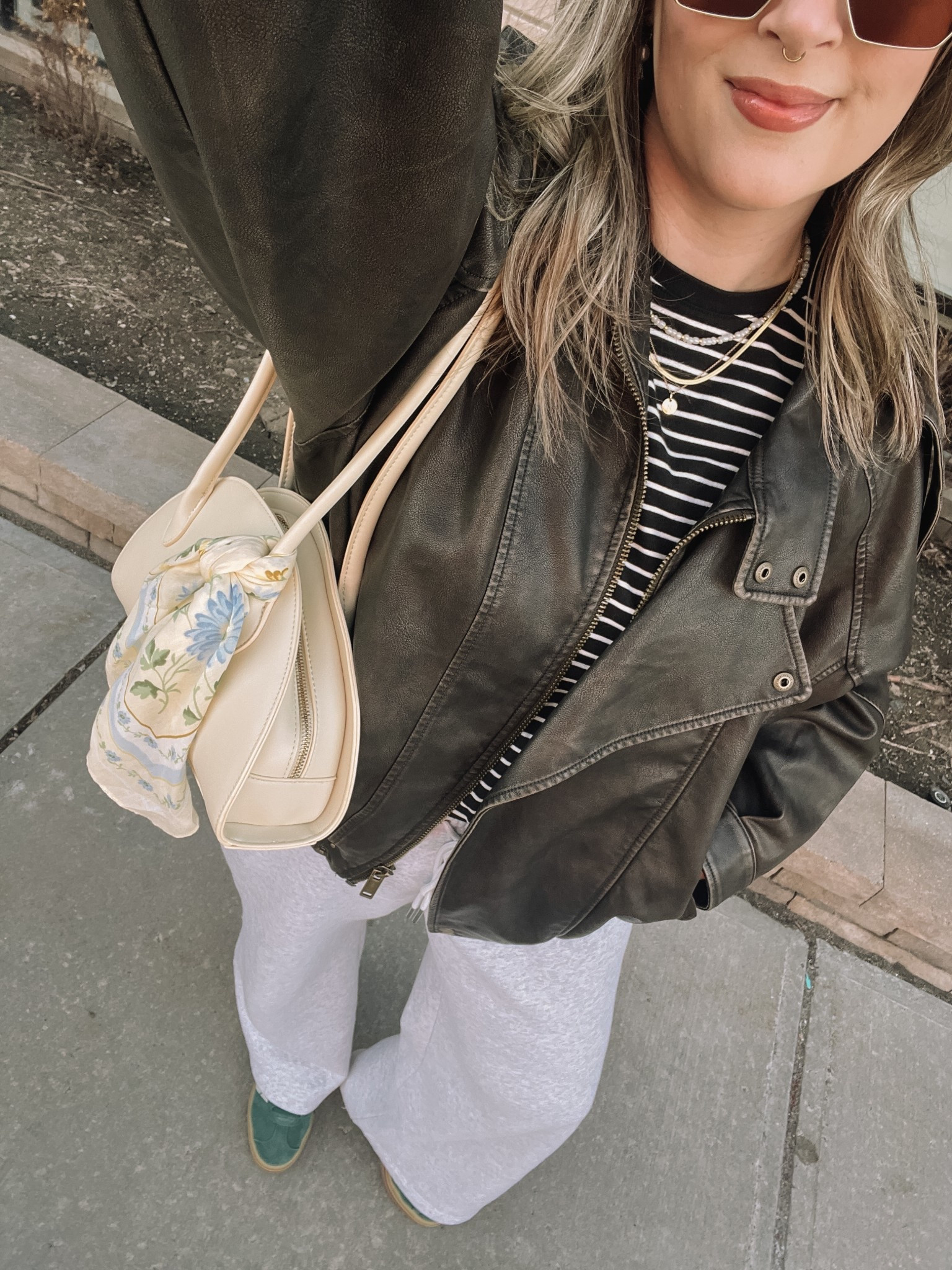 Comfy casual spring outfit! Wearing my usual size L in the wide leg sweatpants (I love the thick material of these!) and L in the leather jacket. Sized up to XL in the tee cause I have a larger chest. Bag and scarf are Old Navy, Canadian links under “similar products”. Adidas gazelle sneakers run a little big, I’m a 9.5-10 and wear a 9.

#LTKmidsize #LTKstyletip #LTKbag