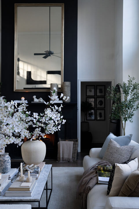 EEK this space is giving effortless elegance. The tall windows, creamy sofa, and those barely there blue touches create the prettiest contrast. I am obsessed with how cozy yet polished it feels. OMG this is the kind of home that makes you slow down and stay awhile. 

 #LTKSpringSale #LTKSeasonal #LTKHome