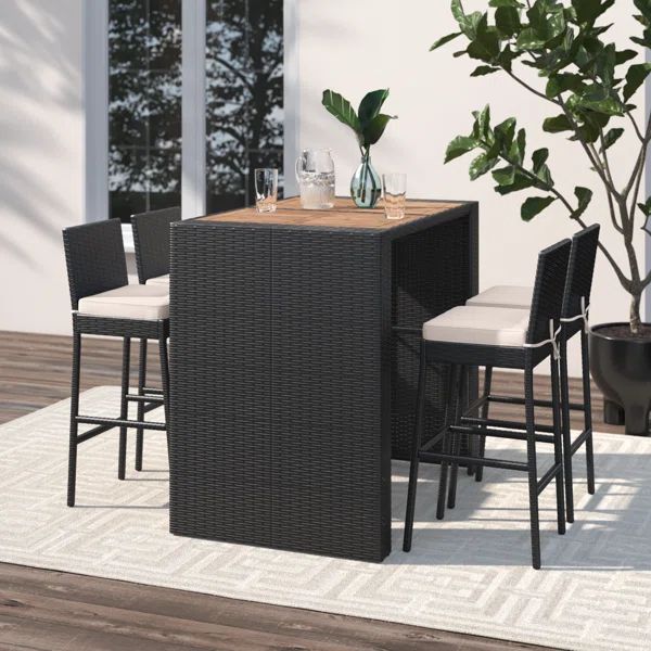 Arnisa 4 - Person Rectangular Outdoor Dining Set with Cushions | Wayfair North America