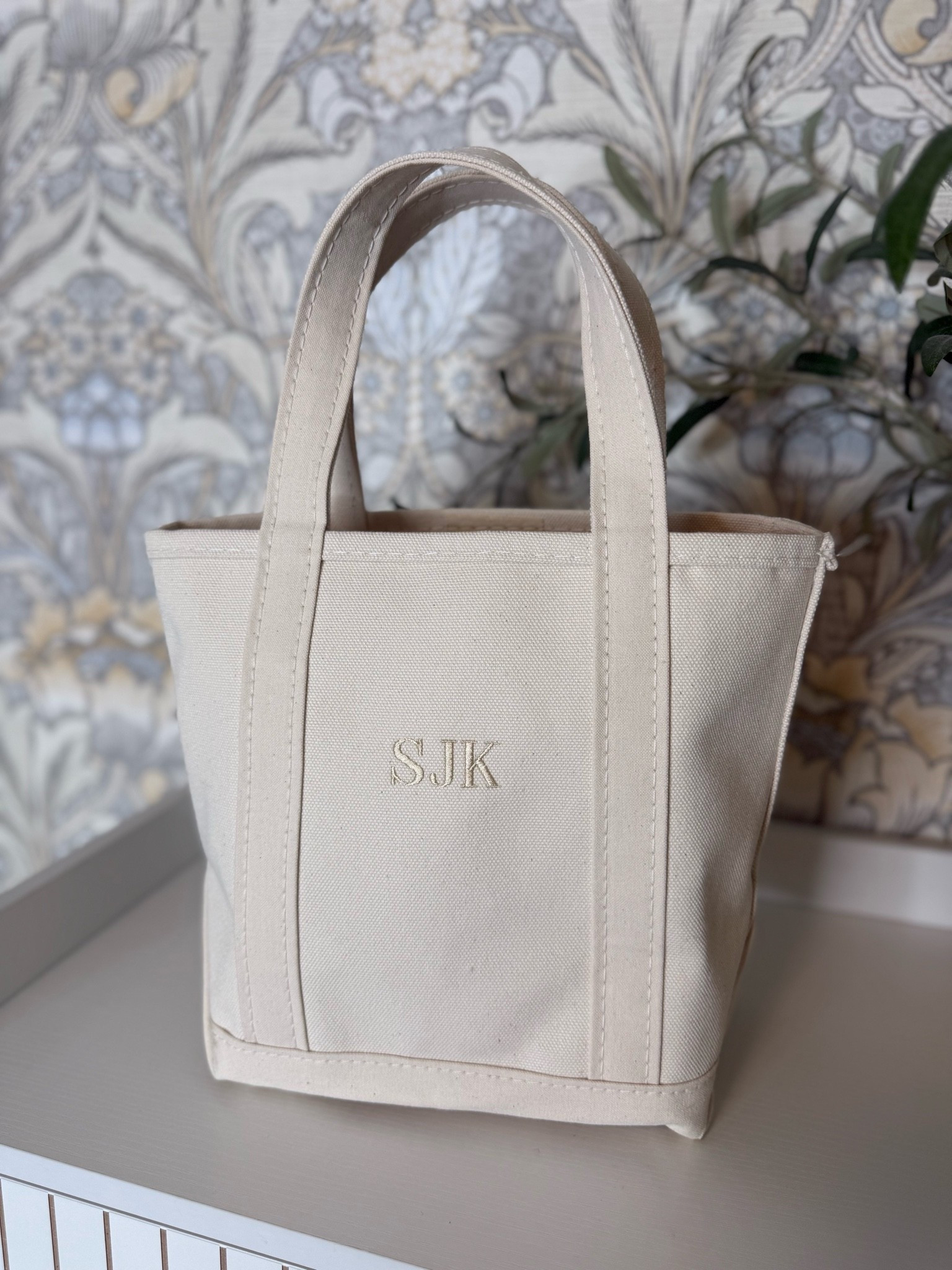 I received this small L.L. Bean tote as a gift and love it. I've been thinking I could use it to carry my books, analog projects, and snacks in the car. I also thought it would be cute to pick a few colors and monogram them for my grandkids. What would you carry?