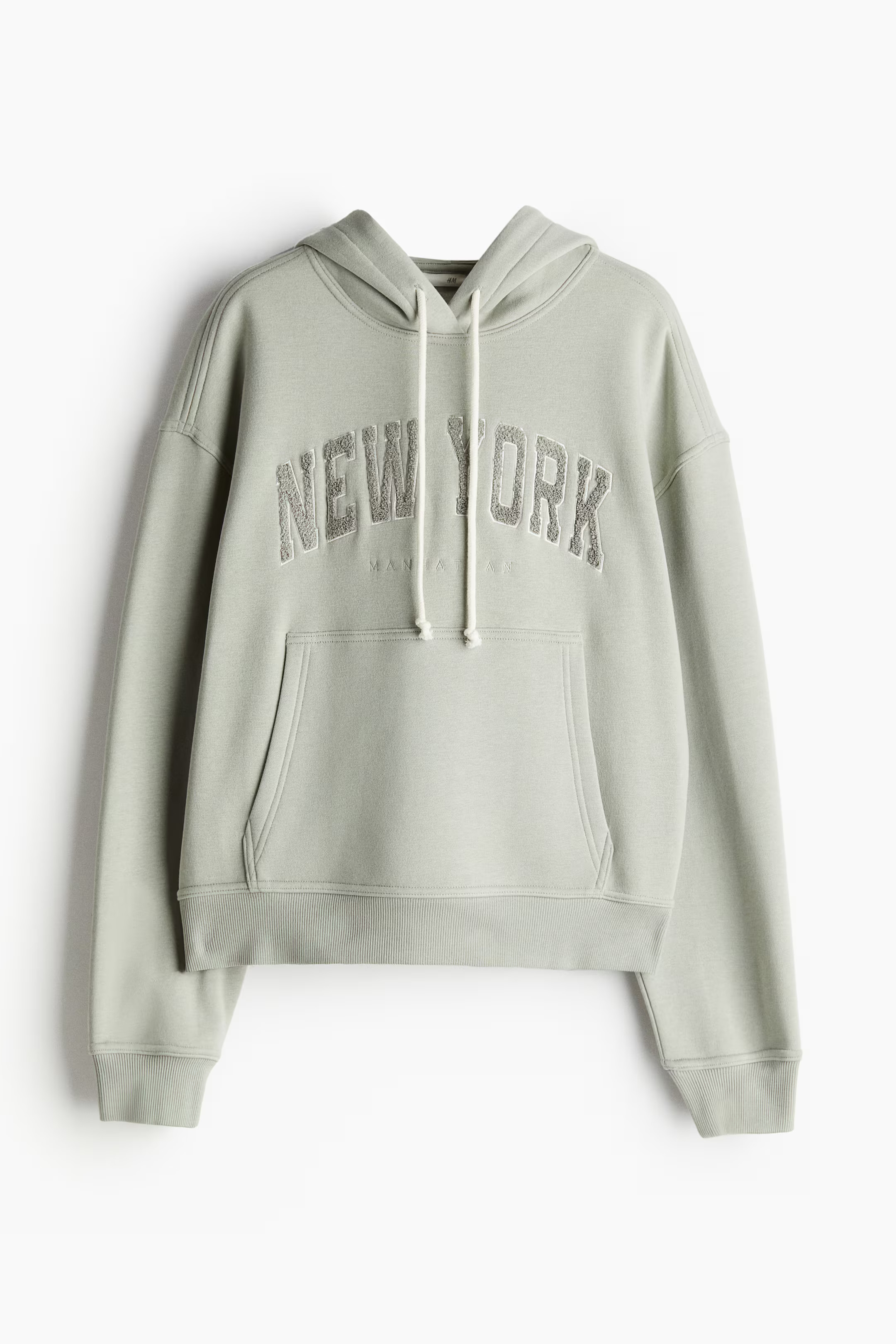 Motif-detail hoodie - Long sleeve - Regular length - Light khaki green/New York - Ladies | H&M GB | H&M (UK, MY, IN, SG, PH, TW, HK)