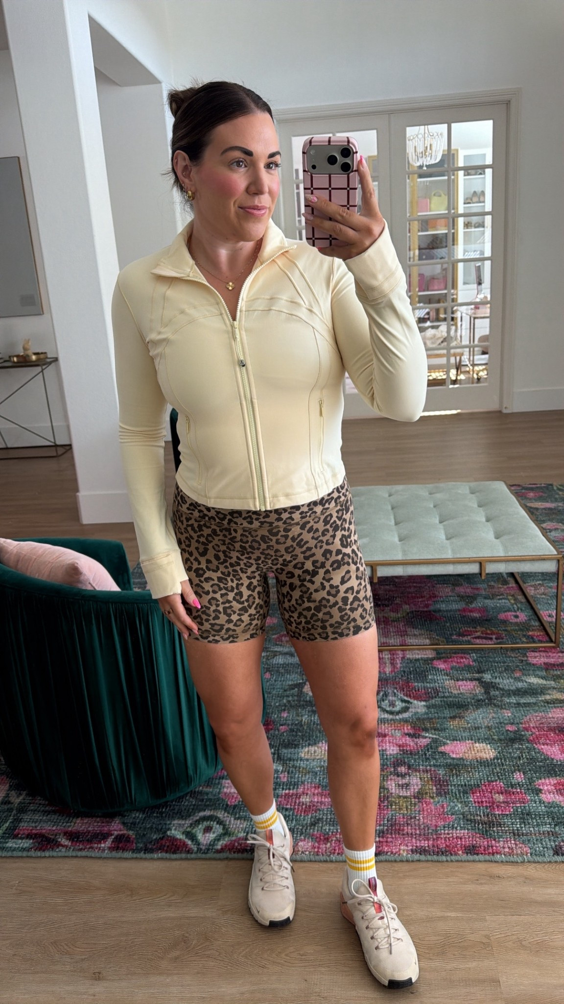 curvy midsize workout outfit! wearing size 10 in butter cream yellow cropped zip up and size 8 in leopard shorts 

#LTKActive #LTKfitnessgoals #LTKMidsize