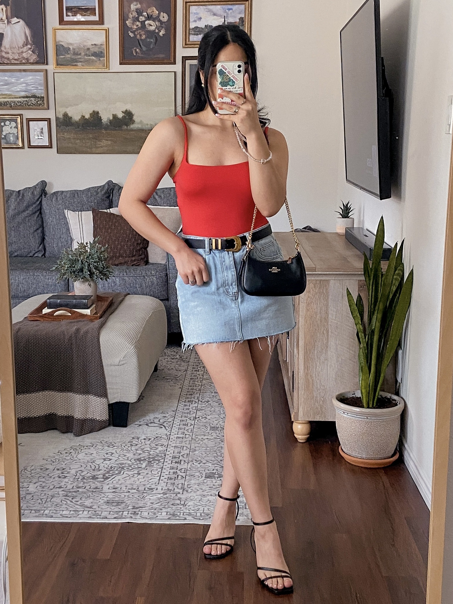wearing this bodysuit and denim skirt in a size medium and both fit true to size. the thong bodysuit is double lined so it’s very opaque. the fabric is soft, stretchy, comfortable, and has adjustable straps. the belt is from amazon and it’s so chic. the shoes are also from amazon and are my most comfortable strappy heels  

#LTKStyleTip #LTKSeasonal #LTKFindsUnder50