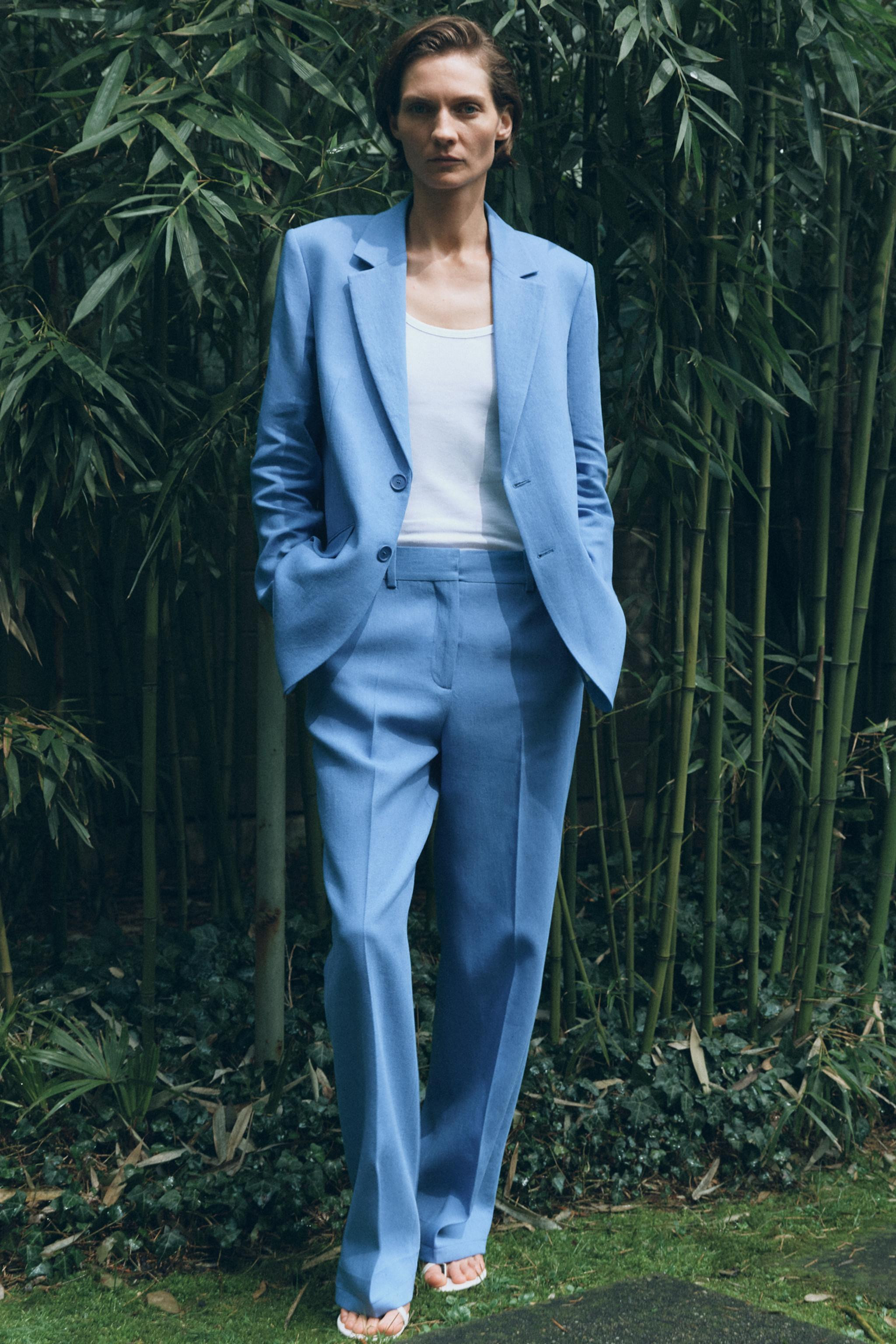 ZARA WOMAN COLLECTIONPantaloni realizzati con filato misto lino. Vita media con passanti. Tasche ... | Zara IT