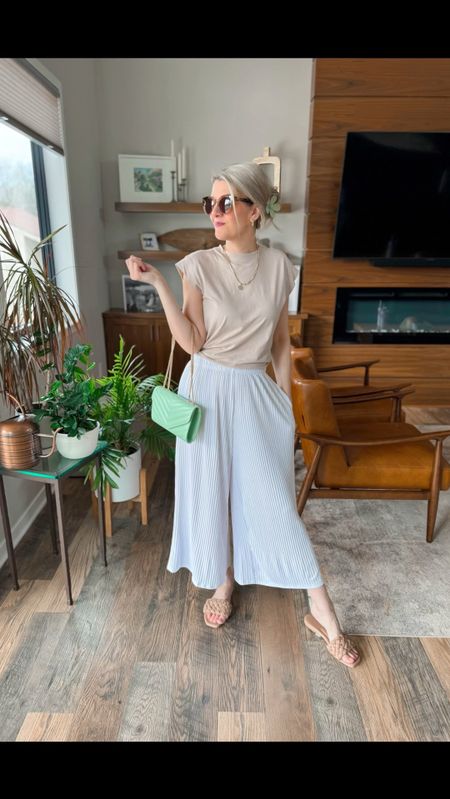 Love these wide leg palazzo pants for spring and summer. They are so comfy and even have pockets. They can be dressed up or down and honestly make a great work pant as well. I would absolutely pack these pleated ankle pants with my wardrobe for beach/resort travel. 


#LTKtravel #LTKstyletip #LTKworkwear