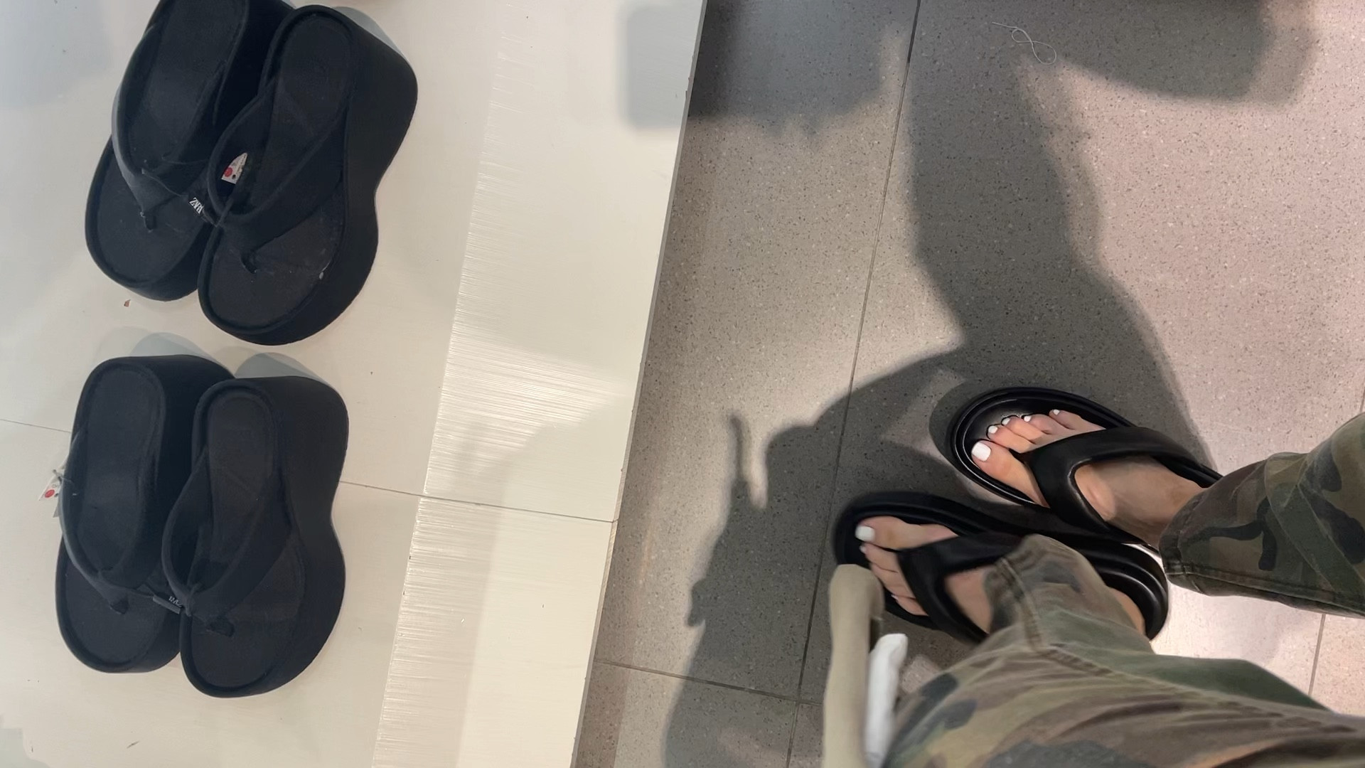 Black chunky sandals.