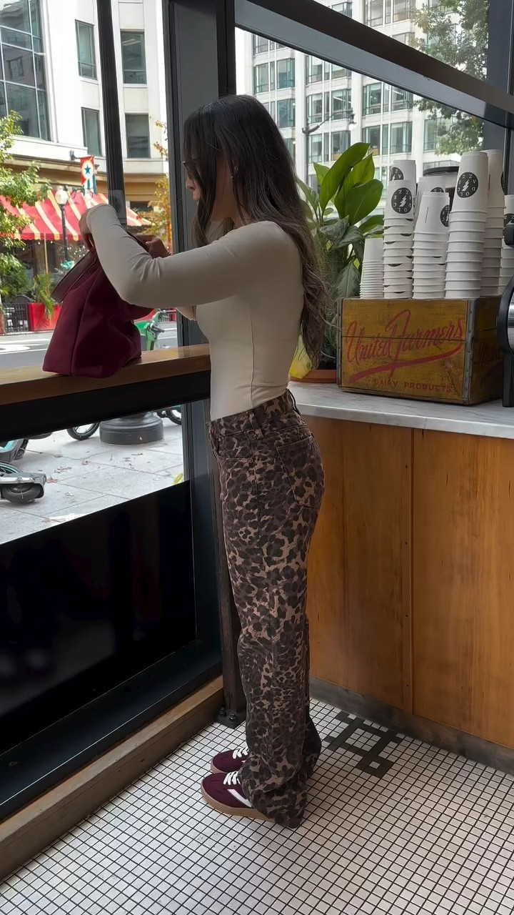 Styling Leopard Jeans for a coffee run 🐆 Are you into the low rise baggy jeans trend? I honestly have mixed feelings, I do like the support of the high rise jeans (specifically postpartum) but I’ve to say, I was super comfortable wearing these jeans and actually enjoyed not having so much compression around my waist. 

90s baggy pants style, loose fit jeans, street wear styles, Y2K, boyfriend jeans, relaxed jeans, 90s throwback, comfort stretch denim, animal print style trend, burgundy sneakers, burgundy bag, suede bag, neutral style, styling animal print
#fallstyles #falloutfitinspo #fallfashion2024 #autumntrends #autumnstyle #autumnfashion #casualoutfitinspo #dcinfluencer

#LTKStyleTip #LTKSeasonal #LTKVideo