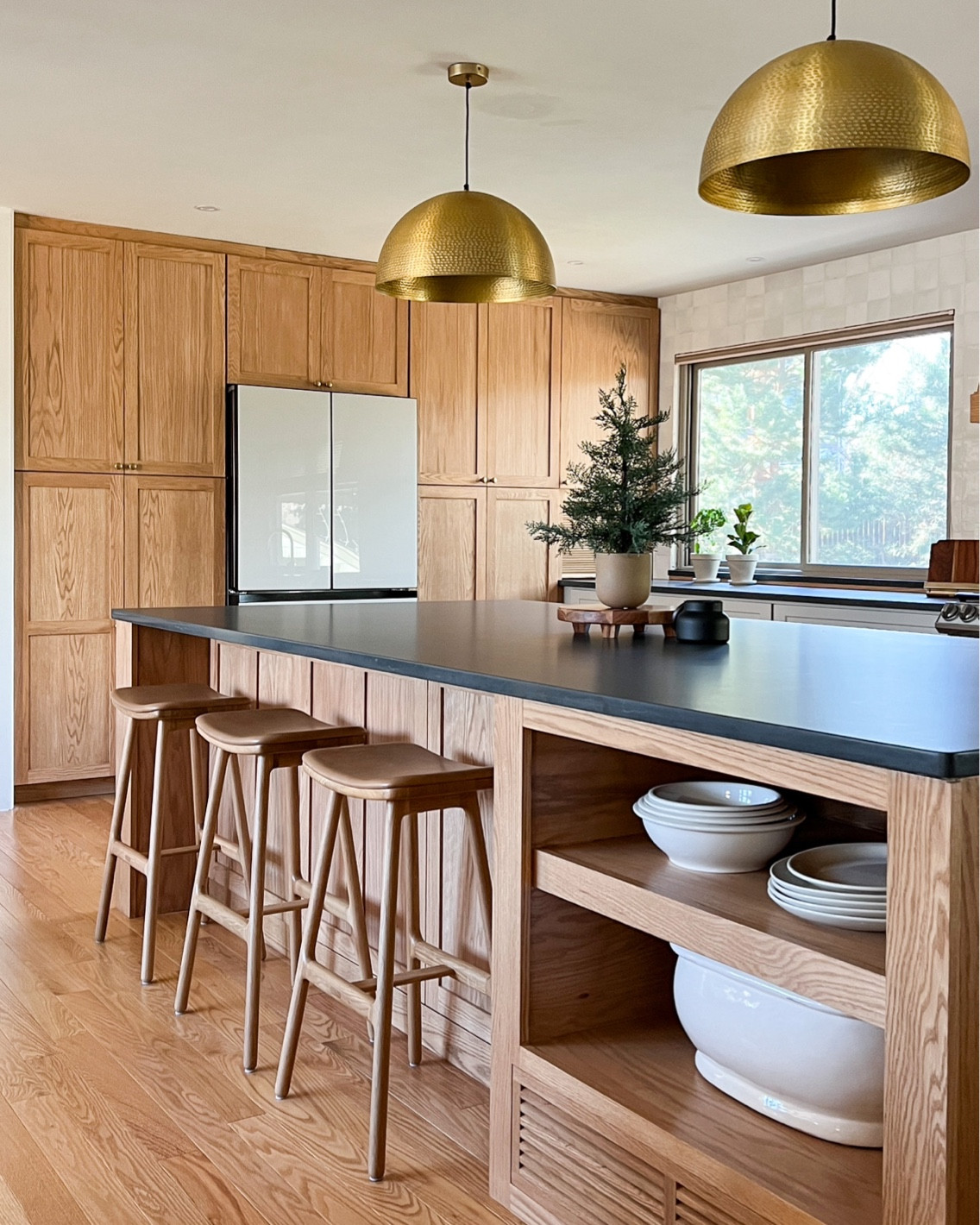 Love looking at our kitchen!! 😍
Oak bar stools. Gold pendant lights. White kitchen bowls and serving platters. Brass hardware. Brass lighting.

#LTKHoliday #LTKhome