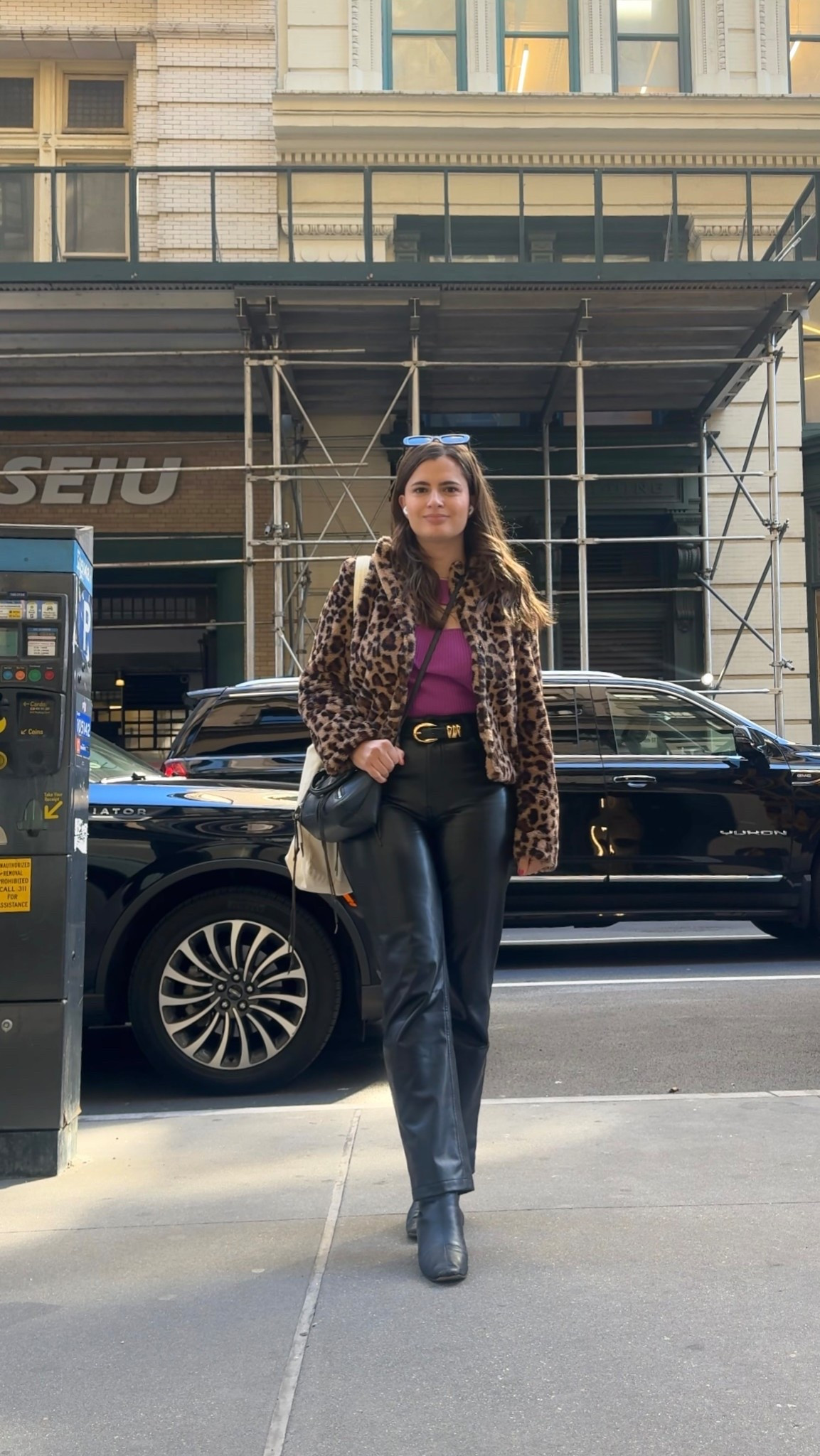 A recent fall outfit that I wore to a work even in the city! These leather pants are actually so comfy, I paired it with a pair of low heel black leather boots too. I love this cutout purple top and linked a similar one and then put a leopard fuzzy jacket on over top, plus a belt from Madewell with gold hardware. I reached for my usual black sunglasses and crossbody purse to finish off the look! 

#LTKStyleTip #LTKFindsUnder100 #LTKSeasonal